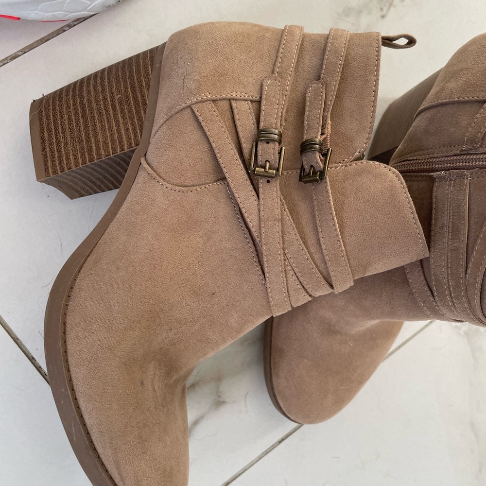 Tan dress boots,  dress up a pair of jeans or complement a pair of dress pants.